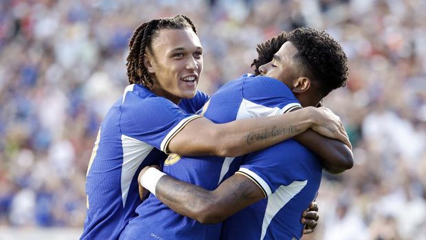 Chelsea's Ian Maatson, right, celebrates his goal against Wrexham with teammates during the first half of a club friendly soccer match Wednesday, July 19, 2023, in Chapel Hill, N.C. (AP Photo/Karl B DeBlaker)