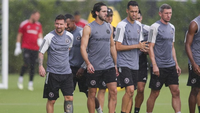 Jul 20, 2023; Miami, FL, USA; Inter Miami CF forward Lionel Messi (left) looks on during team practice at Florida Blue Training Center. Mandatory Credit: Sam Navarro-USA TODAY Sports