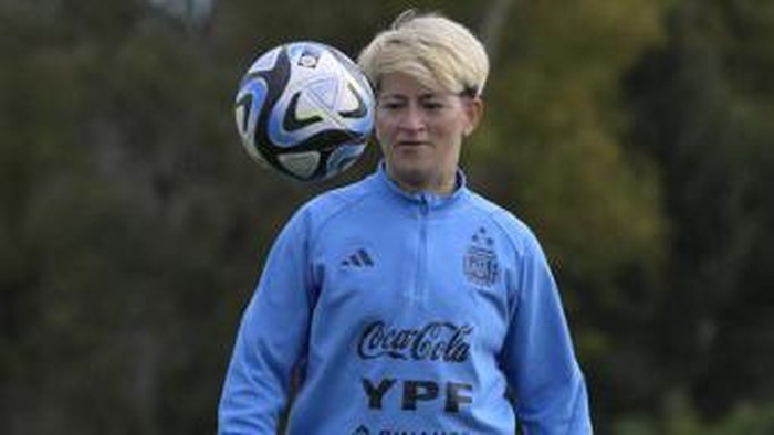 Argentinas forward Yamila Rodriguez shows her left leg tattooed with the portraits of late Argentine football star Diego Maradona (top) and Portuguese Cristiano Ronaldo during a training session in Ezeiza, Buenos Aires Province, on July 6, 2023, ahead of the FIFA Womens World Cup 2023 to be held in Australia and New Zealand between July 20 and August 20. (Photo by JUAN MABROMATA / AFP)