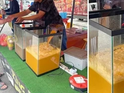 Penjual Minuman Pakai Filter Akuarium Agar Tampilannya Menggiurkan