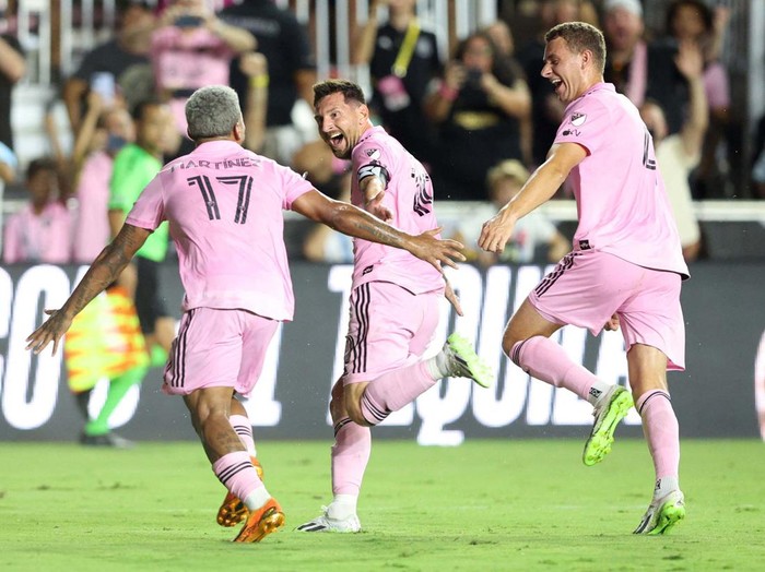 Jul 21, 2023; Fort Lauderdale, FL, USA; Inter Miami CF forward Lionel Messi (10) scores a goal past Cruz Azul goalkeeper Andres Gudiño (30) during the second half at DRV PNK Stadium. Mandatory Credit: Nathan Ray Seebeck-USA TODAY Sports