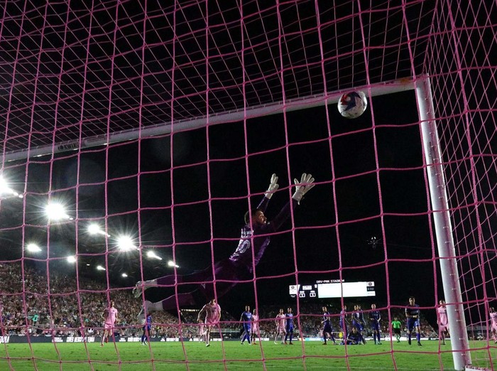 Jul 21, 2023; Fort Lauderdale, FL, USA; Inter Miami CF forward Lionel Messi (10) scores a goal past Cruz Azul goalkeeper Andres Gudiño (30) during the second half at DRV PNK Stadium. Mandatory Credit: Nathan Ray Seebeck-USA TODAY Sports