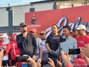 Berbaju Hitam Putih, Gibran Dampingi Ganjar Jalan Sehat di Solo