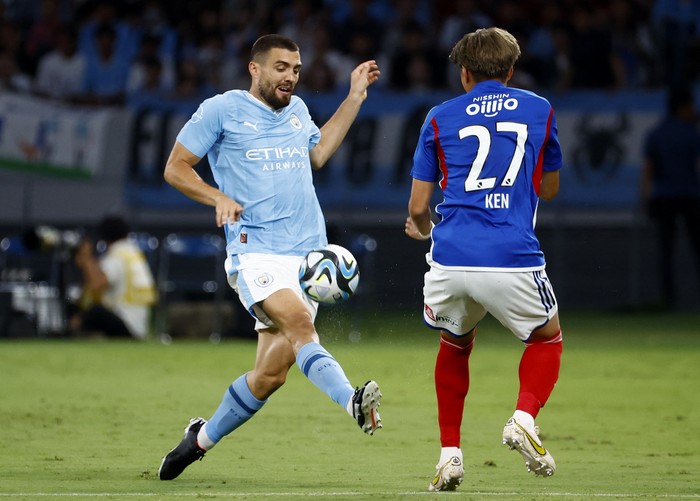 Soccer Football - Pre Season Friendly - Yokohama F Marinos v Manchester City - Japan National Stadium, Tokyo, Japan - July 23, 2023 Manchester Citys Mateo Kovacic in action with Yokohama F. Marinos Ken Matsubara REUTERS/Kim Kyung-Hoon