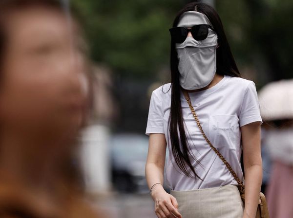 Facekinis Jadi Tren Baru Warga China Gegara Panas Menggila