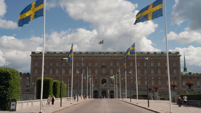 Swedish flags are seen along the road leading to the Royal Palace in Stockholm, Sweden, July 14, 2023. REUTERS/Tom Little