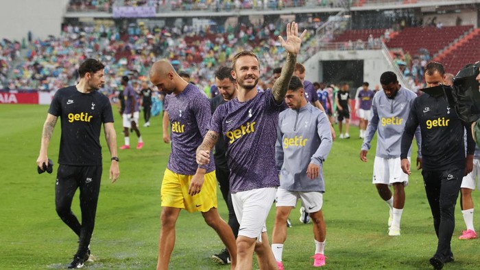 Soccer Football - Pre Season Friendly - Leicester City v Tottenham Hotspur - Rajamangala National Stadium, Bangkok, Thailand - July 23, 2023 Tottenham Hotspurs James Maddison on the pitch as the match is cancelled due to bad weather REUTERS/Athit Perawongmetha