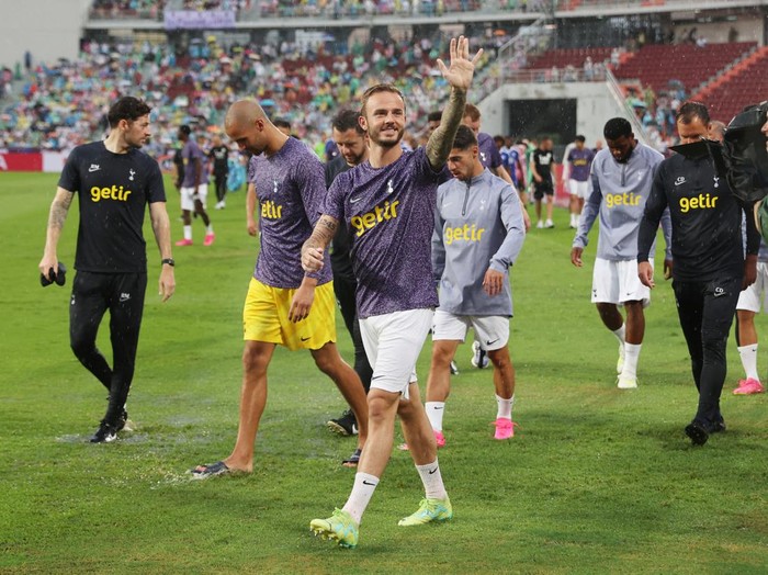 Soccer Football - Pre Season Friendly - Leicester City v Tottenham Hotspur - Rajamangala National Stadium, Bangkok, Thailand - July 23, 2023 Tottenham Hotspur's James Maddison on the pitch as the match is cancelled due to bad weather REUTERS/Athit Perawongmetha