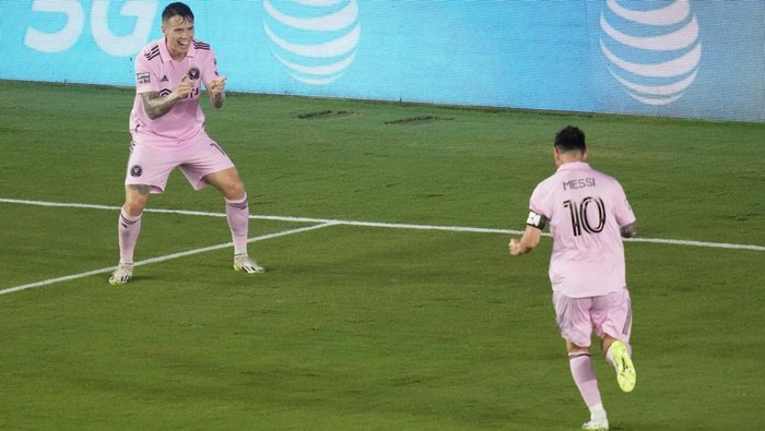 Jul 25, 2023; Fort Lauderdale, FL, USA; Inter Miami CF midfielder Robert Taylor (16) celebrates with forward Lionel Messi (10) after scoring during the second half against Atlanta United at DRV PNK Stadium. Mandatory Credit: John David Mercer-USA TODAY Sports