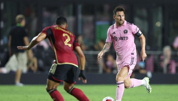 Jul 25, 2023; Fort Lauderdale, FL, USA; Inter Miami CF forward Lionel Messi (10) celebrates with forward Josef Martinez (17) and midfielder Robert Taylor (16) after scoring a goal in the first half against the Atlanta United at DRV PNK Stadium. Mandatory Credit: Jasen Vinlove-USA TODAY Sports     TPX IMAGES OF THE DAY