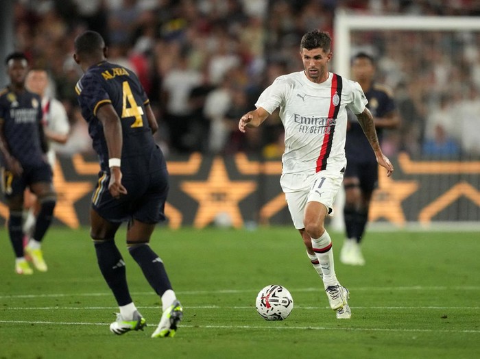 Jul 23, 2023; Pasadena, California, USA; AC Milan forward Christian Pulisic (11) moves the ball against Real Madrid in the second half at the Rose Bowl. Mandatory Credit: Kirby Lee-USA TODAY Sports