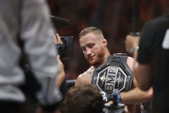 Jul 29, 2023; Salt Lake City, Utah, USA; Justin Gaethje (blue gloves) reacts to defeating Dustin Poirier (red gloves) during UFC 291 at Delta Center. Mandatory Credit: Jeff Swinger-USA TODAY Sports