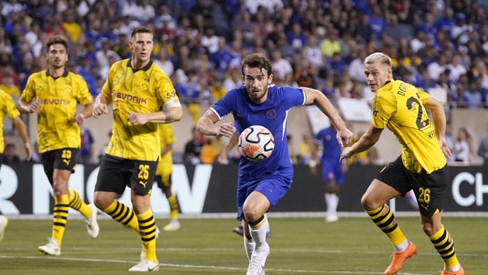 Chelsea defender Ben Chilwell, second from right, chases the ball past Dortmund defender Julian Ryerson, right, during the first half of a club friendly soccer match in Chicago, Wednesday, Aug. 2, 2023. (AP Photo/Nam Y. Huh)