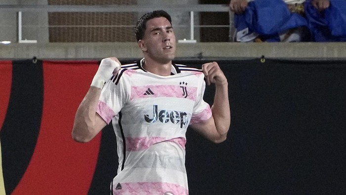 Juventus forward Dusan Vlahovic celebrates after scoring a goal against Real Madrid during the second half of a Champions Cup soccer match Wednesday, Aug. 2, 2023, in Orlando, Fla. (AP Photo/John Raoux)