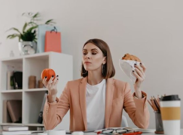 Women are thinking about which food to eat