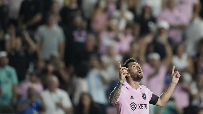 Inter Miami forward Lionel Messi (10) celebrates after scoring his sides third goal against Orlando City during the second half of a Leagues Cup soccer match, Wednesday, Aug. 2, 2023, in Fort Lauderdale, Fla. (AP Photo/Rebecca Blackwell)