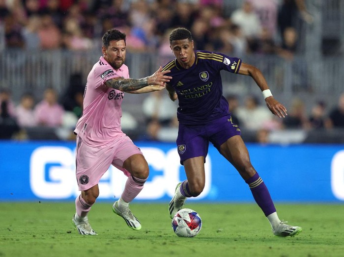 Aug 2, 2023; Fort Lauderdale, FL, USA; Orlando City SC defender Rafael Santos (3) controls the ball while defended by Inter Miami CF forward Lionel Messi (10) during the first half at DRV PNK Stadium. Mandatory Credit: Nathan Ray Seebeck-USA TODAY Sports