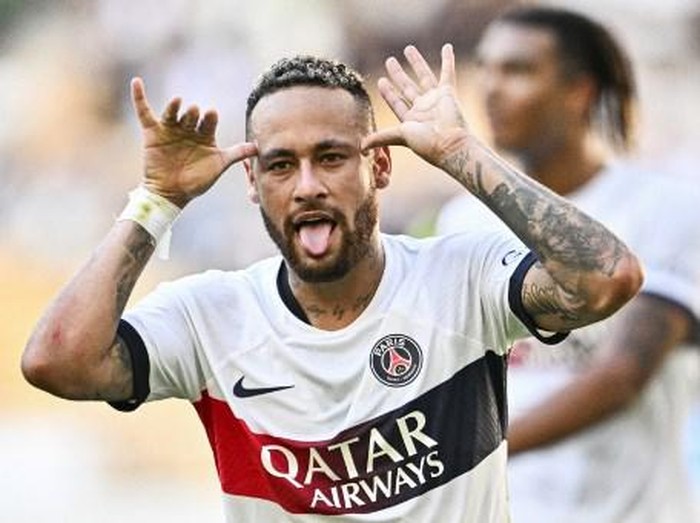 Paris Saint-Germains Neymar celebrates after scoring a goal against Jeonbuk Hyundai Motors during their friendly football match at the Asiad Main Stadium in Busan on August 3, 2023. (Photo by ANTHONY WALLACE / AFP)