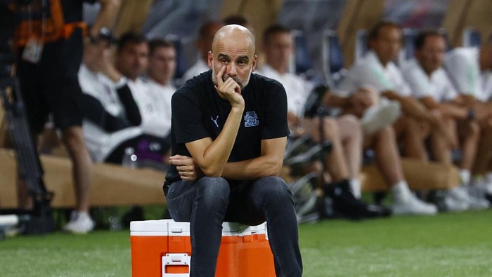 Soccer Football - Pre Season Friendly - Manchester City v Bayern Munich - Japan National Stadium, Tokyo, Japan - July 26, 2023 Manchester City manager Pep Guardiola reacts REUTERS/Kim Kyung-Hoon