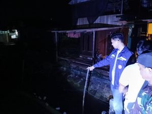 Momen Pria di Bontang Bertarung Selamatkan Istri dari Terkaman Buaya Momen Pria di Bontang Bertarung Selamatkan Istri dari Terkaman Buaya