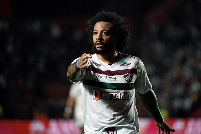 Fluminenses defender Marcelo gestures during the Copa Libertadores round of 16 first leg football match between Argentinas Argentinos Juniors and Brazils Fluminense at the Diego Armando Maradona stadium in Buenos Aires, on August 1, 2023. (Photo by Luis ROBAYO / AFP)