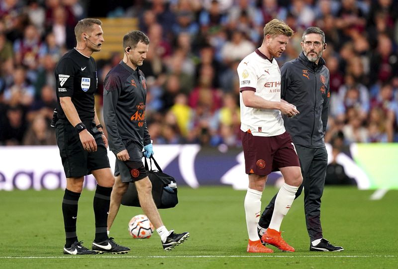 Manchester City's Kevin De Bruyne appears dejected after being substituted off for an injury during the Premier League soccer match between Manchester City and Burnley FC at Turf Moor, Burnley, England, Friday Aug. 11, 2023. (Mike Egerton/PA via AP)
