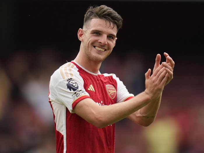 Arsenal's Declan Rice greets fans at the end of the English Premier League soccer match between Arsenal and Nottingham Forest at Emirates stadium in London, Saturday, Aug. 12, 2023. (AP Photo/Kirsty Wigglesworth)
