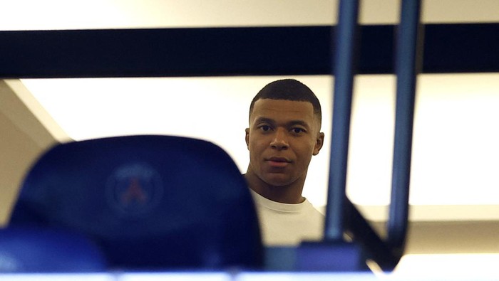 Soccer Football - Ligue 1 - Paris St Germain v Lorient - Parc des Princes, Paris, France - August 12, 2023  Paris St Germains Kylian Mbappe is seen in the stands ahead of the match REUTERS/Christian Hartmann