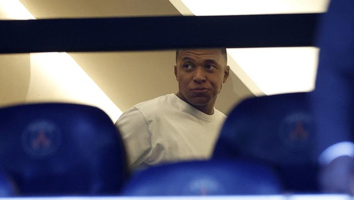 Soccer Football - Ligue 1 - Paris St Germain v Lorient - Parc des Princes, Paris, France - August 12, 2023  Paris St Germains Kylian Mbappe is seen in the stands ahead of the match REUTERS/Christian Hartmann
