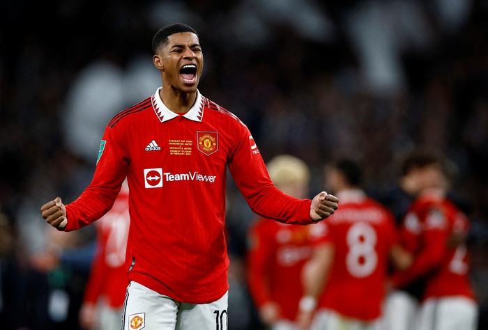 FILE PHOTO: Soccer Football - Carabao Cup - Final - Manchester United v Newcastle United - Wembley Stadium, London, Britain - February 26, 2023  Manchester Uniteds Marcus Rashford celebrates after winning the Carabao Cup final Action Images via Reuters/John Sibley EDITORIAL USE ONLY. No use with unauthorized audio, video, data, fixture lists, club/league logos or live services. Online in-match use limited to 75 images, no video emulation. No use in betting, games or single club /league/player publications.  Please contact your account representative for further details./File Photo