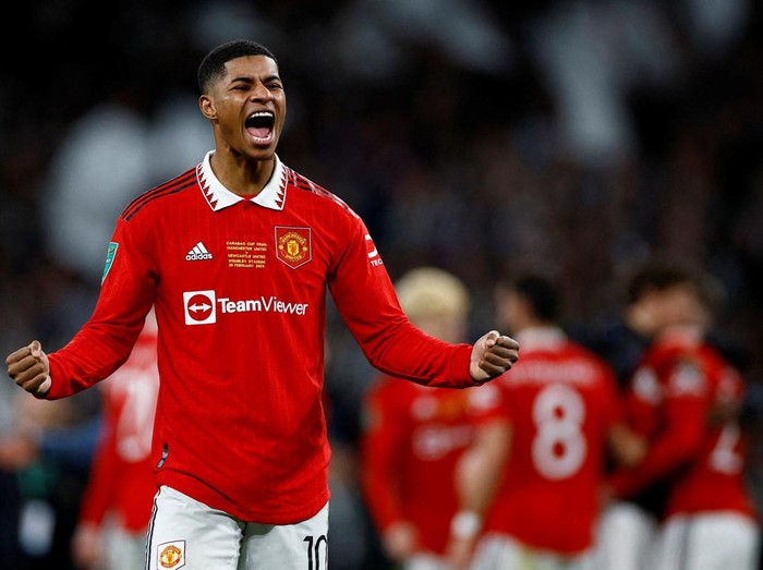 FILE PHOTO: Soccer Football - Carabao Cup - Final - Manchester United v Newcastle United - Wembley Stadium, London, Britain - February 26, 2023  Manchester United's Marcus Rashford celebrates after winning the Carabao Cup final Action Images via Reuters/John Sibley EDITORIAL USE ONLY. No use with unauthorized audio, video, data, fixture lists, club/league logos or 'live' services. Online in-match use limited to 75 images, no video emulation. No use in betting, games or single club /league/player publications.  Please contact your account representative for further details./File Photo