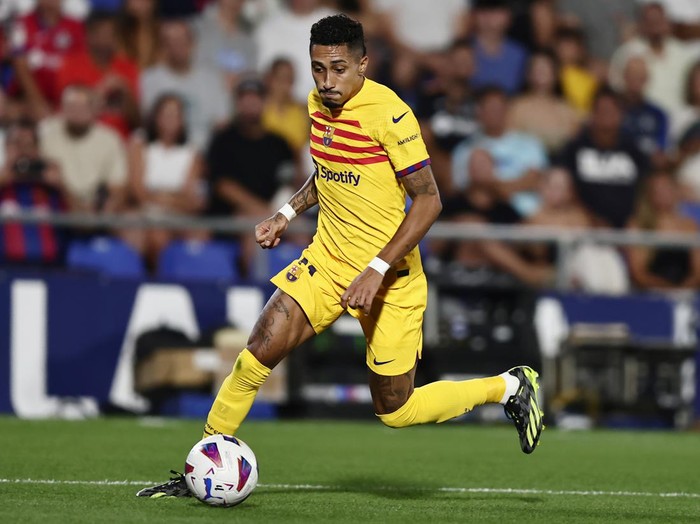 Barcelona's Raphinha controls the ball during the Spanish La Liga soccer match between Getafe and FC Barcelona at the Coliseum Alfonso Perez stadium in Getafe, Spain, Sunday, Aug. 13, 2023. (AP Photo/Alvaro Medranda)