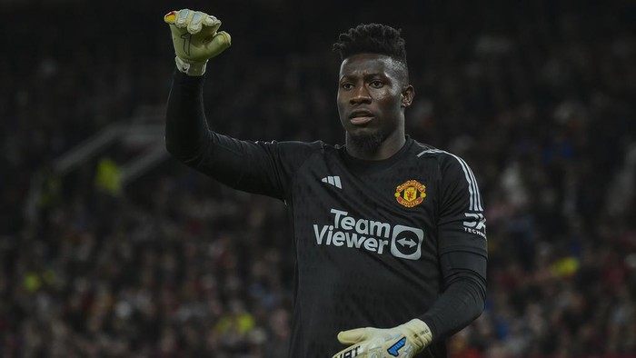 Manchester Uniteds goalkeeper Andre Onana reacts during the English Premier League soccer match between Manchester United and Wolverhampton at the Old Trafford stadium in Manchester, England, Monday, Aug. 14, 2023. (AP Photo/Rui Vieira)