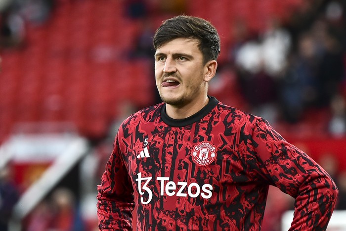 Manchester Uniteds Harry Maguire looks on during warm up before the English Premier League soccer match between Manchester United and Wolverhampton at the Old Trafford stadium in Manchester, England, Monday, Aug. 14, 2023. (AP Photo/Rui Vieira)