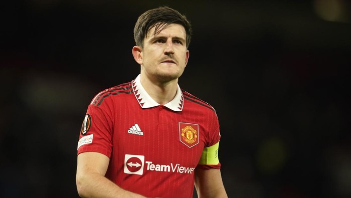 FILE - Manchester Uniteds Harry Maguire walks off the pitch after the Europa League first leg quarterfinal soccer match between Manchester United and Sevilla at the Old Trafford stadium in Manchester, on April 13, 2023. Maguire is no longer captain of Manchester United following talks with manager Erik ten Hag. (AP Photo/Dave Thompson, File)
