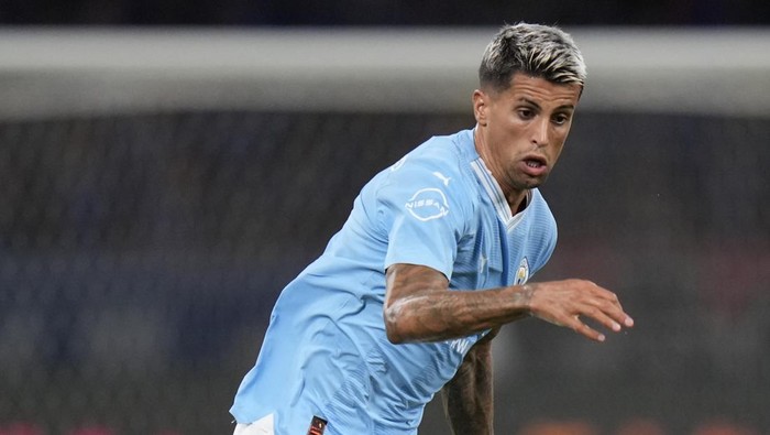 Manchester Citys Joao Cancelo plays during a friendly soccer match against Yokohama F Marinos in Tokyo, Japan, Sunday, July 23, 2023.(AP Photo/Shuji Kajiyama)