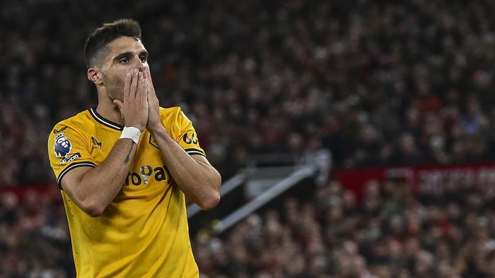 Pedro Neto Wolverhampton Wanderers' Pedro Neto reacts after Manchester United's Raphael Varane scores his side's opening goal during the English Premier League soccer match between Manchester United and Wolverhampton at the Old Trafford stadium in Manchester, England, Monday, Aug. 14, 2023. (AP Photo/Rui Vieira)