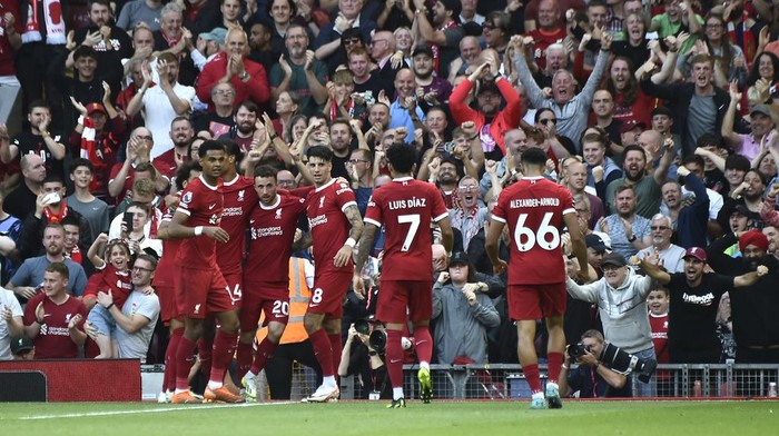 Liverpools Diogo Jota, third left, celebrates with teammates after scoring his sides third goal during the Premier League soccer match between Liverpool and AFC Bournemouth at Anfield, in Liverpool, England, Saturday, Aug. 19, 2023. (AP Photo/Rui Vieira)