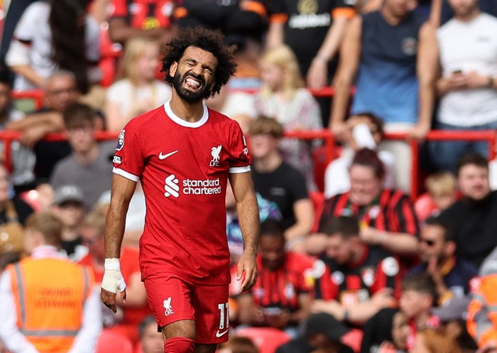 Soccer Football - Premier League - Liverpool v AFC Bournemouth - Anfield, Liverpool, Britain - August 19, 2023 Liverpools Mohamed Salah celebrates scoring their first goal REUTERS/David Klein EDITORIAL USE ONLY. No use with unauthorized audio, video, data, fixture lists, club/league logos or live services. Online in-match use limited to 75 images, no video emulation. No use in betting, games or single club /league/player publications.  Please contact your account representative for further details.