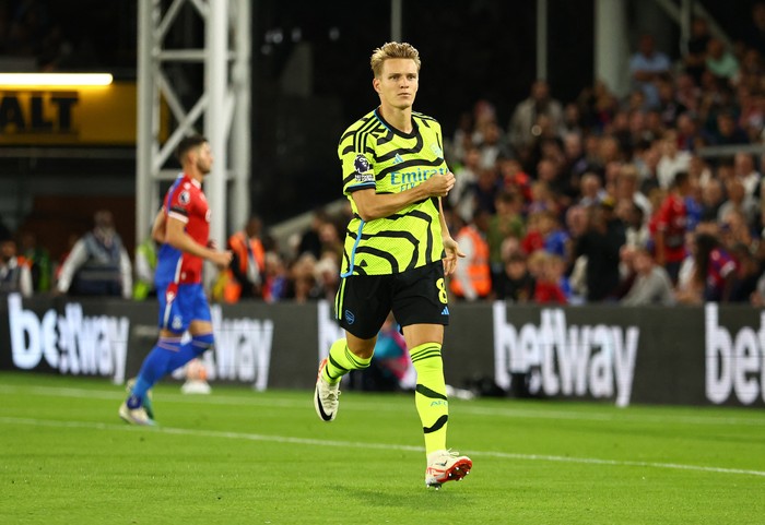 Soccer Football - Premier League - Crystal Palace v Arsenal - Selhurst Park, London, Britain - August 21, 2023 Arsenals Martin Odegaard celebrates scoring their first goal Action Images via Reuters/Andrew Boyers EDITORIAL USE ONLY. No use with unauthorized audio, video, data, fixture lists, club/league logos or live services. Online in-match use limited to 75 images, no video emulation. No use in betting, games or single club /league/player publications.  Please contact your account representative for further details