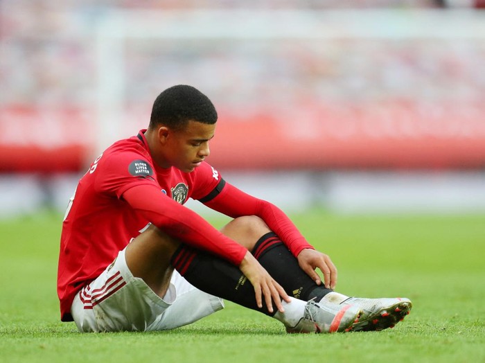 FILE PHOTO: Soccer Football - Premier League - Manchester United v West Ham United - Old Trafford, Manchester, Britain - July 22, 2020 Manchester Uniteds Mason Greenwood looks dejected after the match, as play resumes behind closed doors following the outbreak of the coronavirus disease (COVID-19) Pool via REUTERS/Catherine Ivill/File Photo EDITORIAL USE ONLY. No use with unauthorized audio, video, data, fixture lists, club/league logos or live services. Online in-match use limited to 75 images, no video emulation. No use in betting, games or single club/league/player publications.  Please contact your account representative for further details.