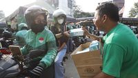 Grab Bagikan 125 Ribu Masker untuk Pengemudi dan Penumpang