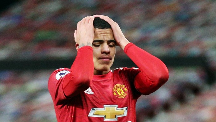 FILE PHOTO: Soccer Football - Premier League - Manchester United v Everton - Old Trafford, Manchester, Britain - February 6, 2021 Manchester Uniteds Mason Greenwood reacts Pool via REUTERS/Alex Pantling/File Photo EDITORIAL USE ONLY. No use with unauthorized audio, video, data, fixture lists, club/league logos or live services. Online in-match use limited to 75 images, no video emulation. No use in betting, games or single club /league/player publications.  Please contact your account representative for further details.