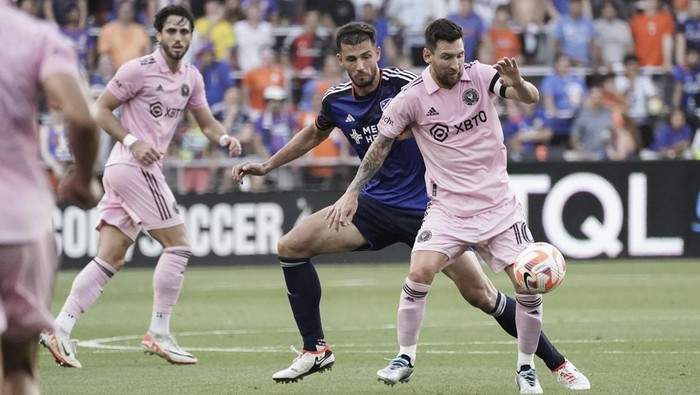 Inter Miami forward Lionel Messi, right, controls the ball next to FC Cincinnati defender Matt Miazga during the first half of a U.S. Open Cup soccer semifinal Wednesday, Aug. 23, 2023, in Cincinnati. (AP Photo/Joshua A. Bickel)