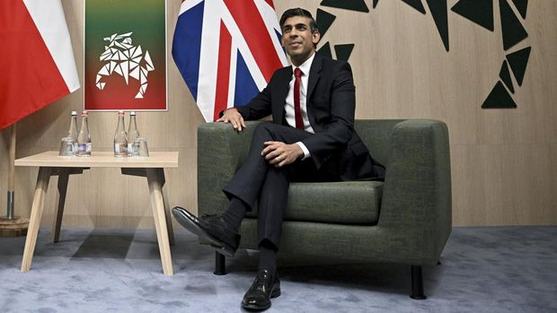 Britain's Prime Minister Rishi Sunak right and Poland's President Andrzej Duda hold bilateral talks, during the NATO Summit in Vilnius, Lithuania, Tuesday, July 11, 2023. (Paul Ellis/Pool Photo via AP)