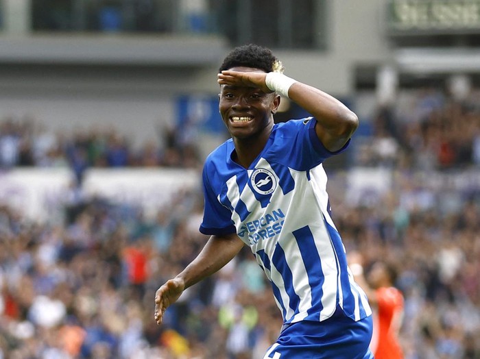 Soccer Football - Premier League - Brighton & Hove Albion v Luton Town - The American Express Community Stadium, Brighton, Britain - August 12, 2023 Brighton & Hove Albion's Simon Adingra celebrates scoring their third goal Action Images via Reuters/Peter Cziborra EDITORIAL USE ONLY. No use with unauthorized audio, video, data, fixture lists, club/league logos or 'live' services. Online in-match use limited to 75 images, no video emulation. No use in betting, games or single club /league/player publications.  Please contact your account representative for further details.