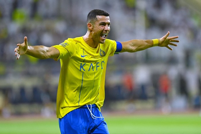 cristiano ronaldo al nassr saudi pro league al fateh fc vs al nassr liga pro arab saudi Nassr's Portuguese forward #07 Cristiano Ronaldo celebrates after scoring during the Saudi Pro League football match between Al-Nassr and Al-Fateh at the Prince Abdullah Bin Jalawi Stadium in al-Hasa, on August 25, 2023. (Photo by Ali Al-HAJI / AFP)