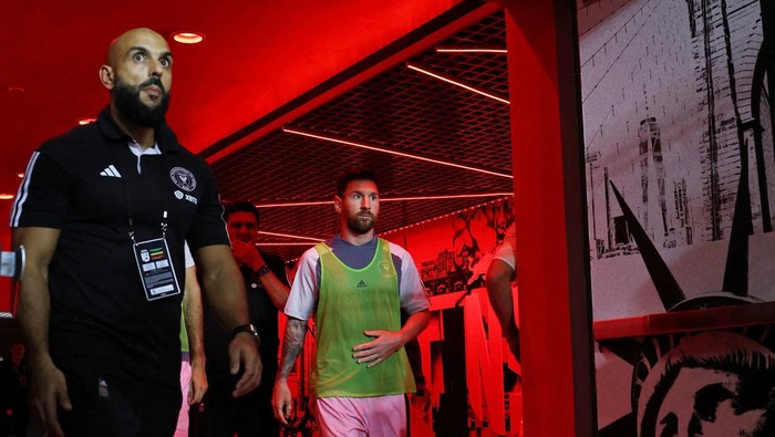 Lionel Messi, Yassine Chueko Aug 26, 2023; Harrison, New Jersey, USA; Inter Miami CF forward Lionel Messi (10) walks through the tunnel to the field during halftime against the New York Red Bulls at Red Bull Arena. Mandatory Credit: Vincent Carchietta-USA TODAY Sports