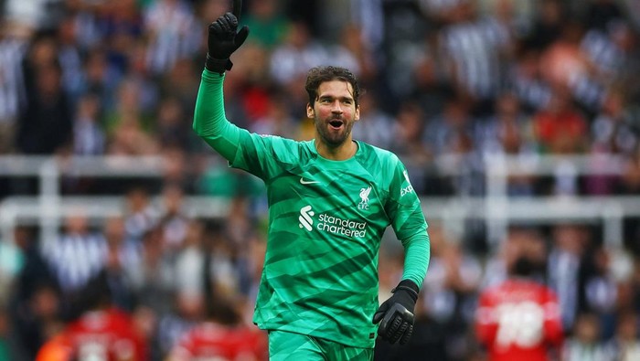 Soccer Football - Premier League - Newcastle United v Liverpool - St James Park, Newcastle, Britain - August 27, 2023 Liverpools Alisson celebrates after Darwin Nunez scores their second goal Action Images via Reuters/Lee Smith EDITORIAL USE ONLY. No use with unauthorized audio, video, data, fixture lists, club/league logos or live services. Online in-match use limited to 75 images, no video emulation. No use in betting, games or single club /league/player publications.  Please contact your account representative for further details.