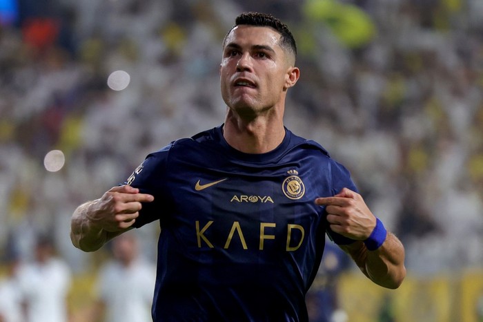 Nassrs Portuguese forward #07 Cristiano Ronaldo celebrates his second goal during the Saudi Pro League football match between Al-Nassr and Al-Shabab in Riyadhs Al-Awal Park Stadium on August 29, 2023. (Photo by Fayez Nureldine / AFP)